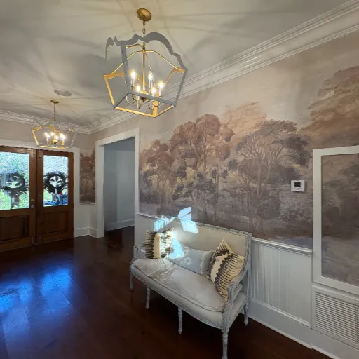 Entryway with wood flooring and love seat 